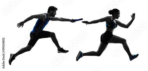 athletics relay runners sprinters running runners in silhouette isolated on white background photo