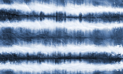 striped tie dye pattern on cotton fabric abstract background.