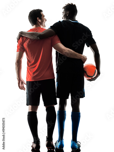 two soccer players men in studio silhouette isolated on white background