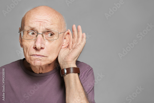 Elderly man with hearing pr...
