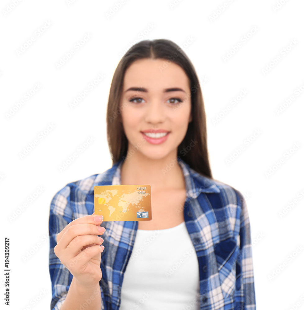 Young woman with credit card on white background. Online shopping Young woman with credit card on white background. Online shopping