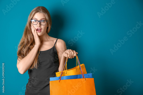 Emotional young woman with ...