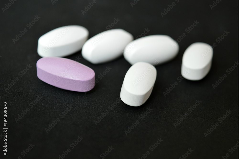 Medication pills of different colors. Medication pills of different colors.