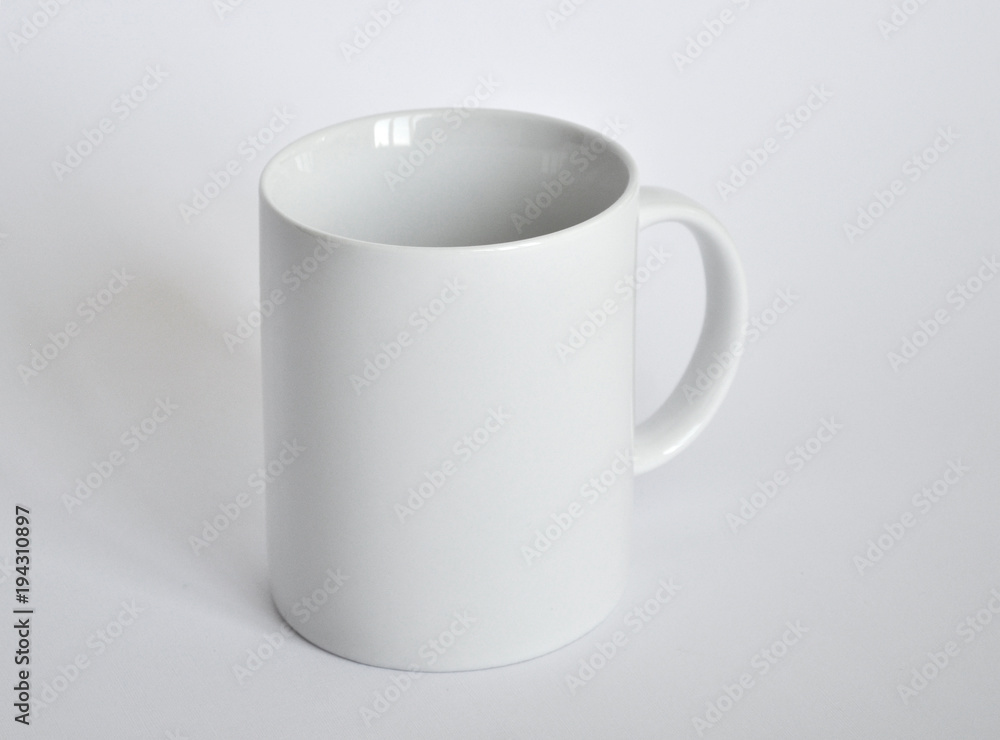 Obraz premium White cup on a white
