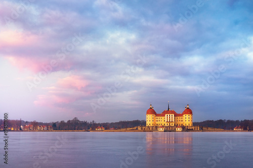sunrise view in winter on Moritzburg castle named after Duke Moritz of Saxony, Germany