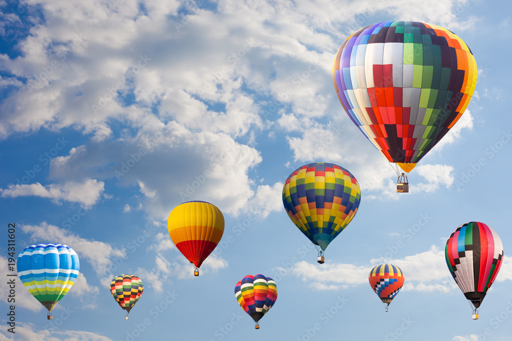 Colorful hot air balloon fly over the blue sky Colorful hot air balloon fly over the blue sky