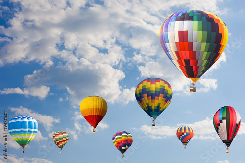 Carta da parati Colorful hot air balloon fly over the blue sky