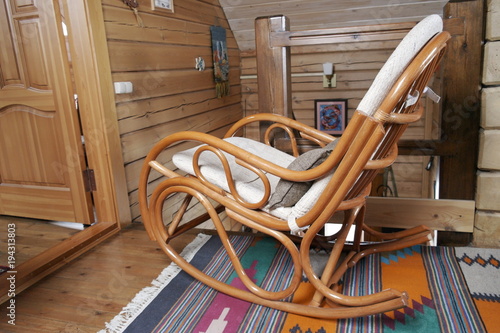 Кресло качалка в деревянном доме
