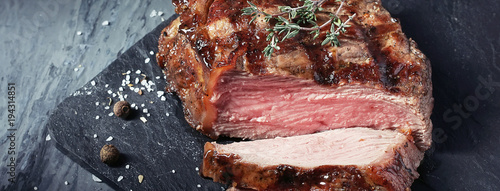 Banner of closeup of cut medium rare roast beef steak
