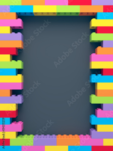 Frame of stacked colorful toy bricks