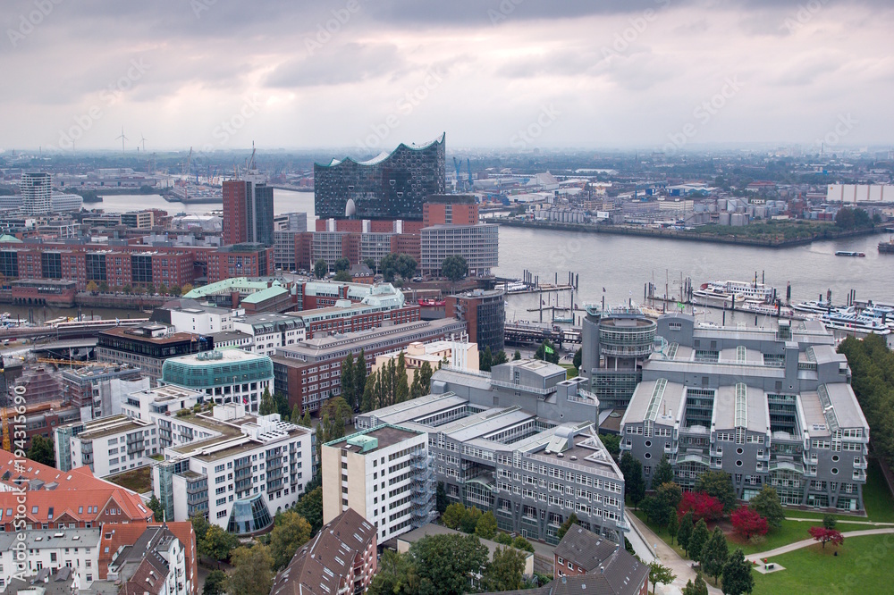 Aerial view of the harbor district, HafenCity, the concert hall `Elbphilharmonie` and downtown of Hamburg, Germany.