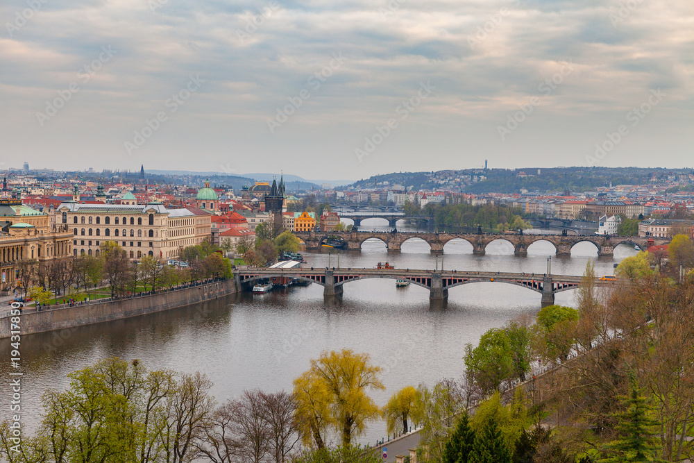 Ancient bridges of Prague over Vltava river. Heart of old town. Czech Republic. Spring time.