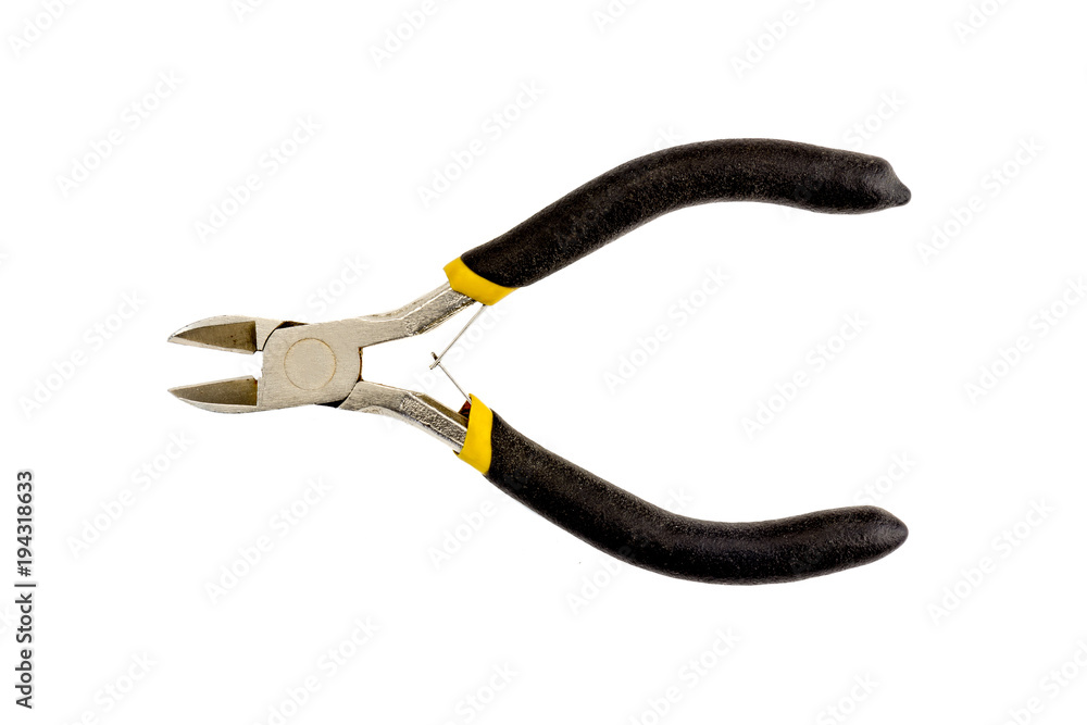 Small cutters with red and black handle isolated on white background. Tools series. Small cutters with red and black handle isolated on white background. Tools series.