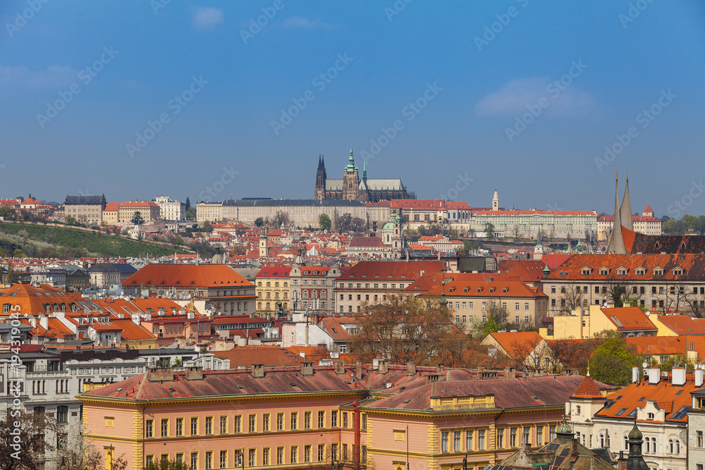 Prague rooftops. Beautiful aerial view of Czech baroque architecture, churches and cathedral.