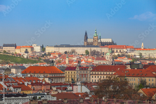 Prague rooftops. Beautiful aerial view of Czech baroque architecture, churches and cathedral.