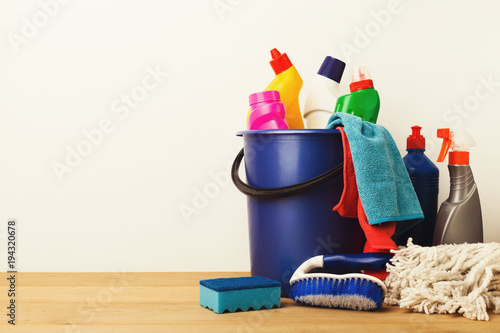 Variety of house cleaning products on table