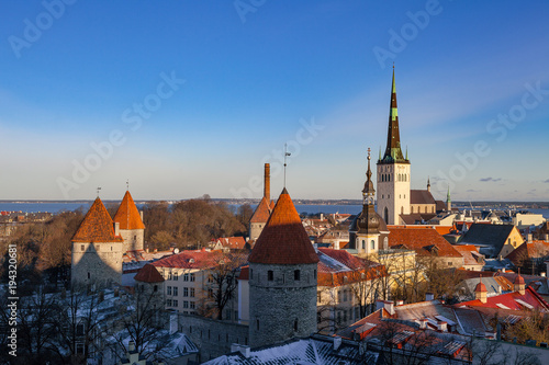 Old Tallinn architecture ensemble. Aerial view of towers, red roofs and biggest church
