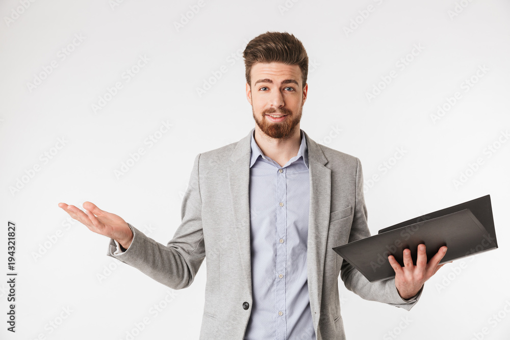 Portrait of a friendly young man dressed in shirt Portrait of a friendly young man dressed in shirt