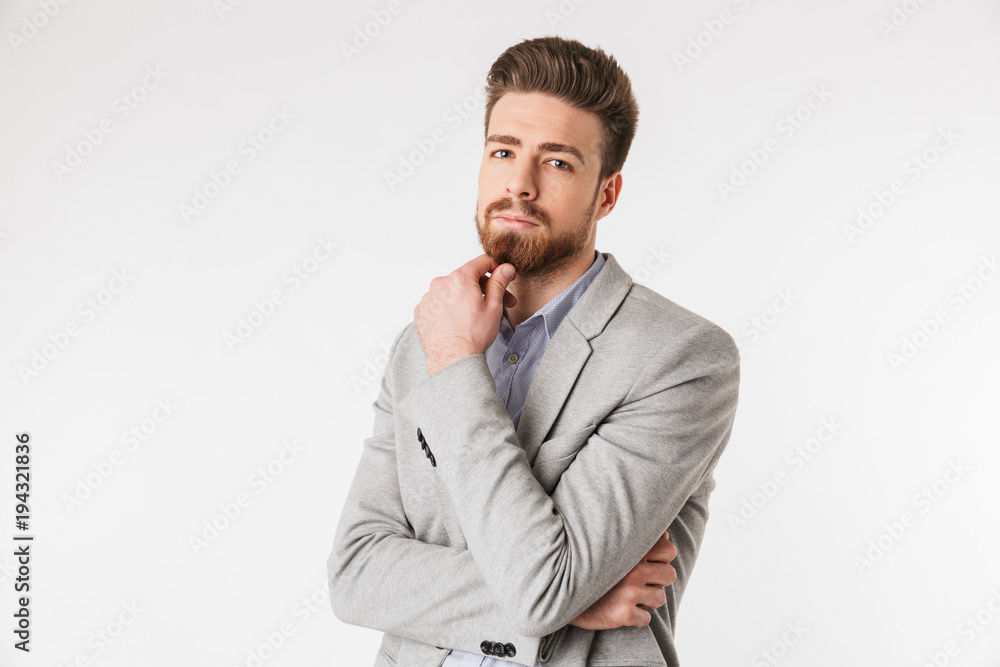 Portrait of a pensive young man dressed in shirt Portrait of a pensive young man dressed in shirt