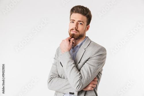 Portrait of a pensive young man dressed in shirt
