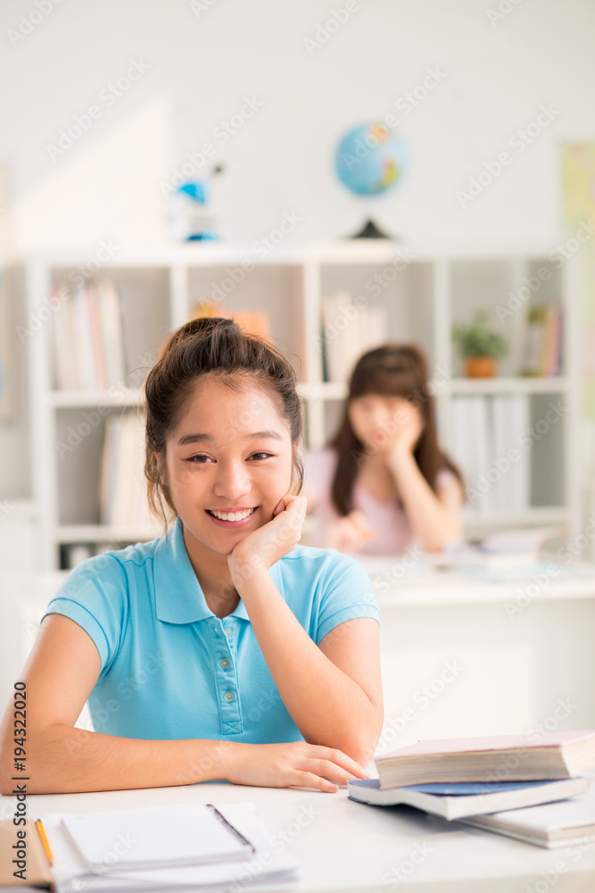 Portrait of Cheerful Asian Pupil