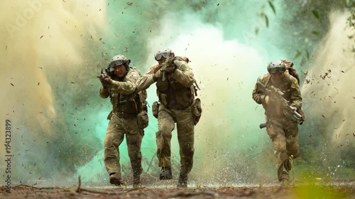 Military men in action, slow motion photo