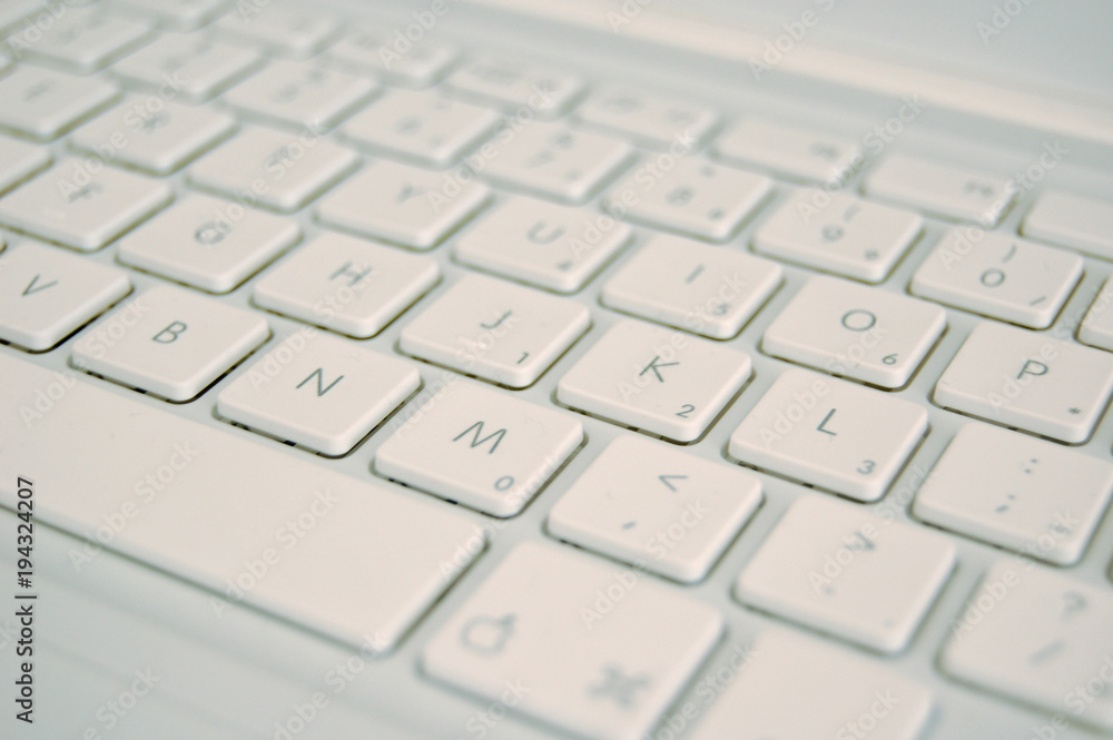 Modern white keyboard, white famous brand model Modern white keyboard, white famous brand model