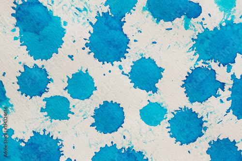 Watercolor blue abstract background. Hand made splashes on watercolor grainy textured paper. © Cristina V.