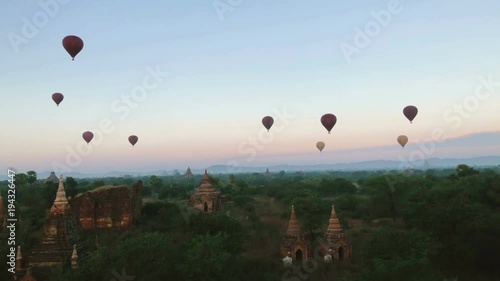 Time lapse of Hot Balloons flying over Bagan Temples in the sky. Bagan Pagodas in Mandalay Region of Myanmar