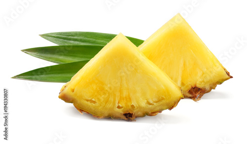 healthy background. pineapple slices with green leaves isolated on white background