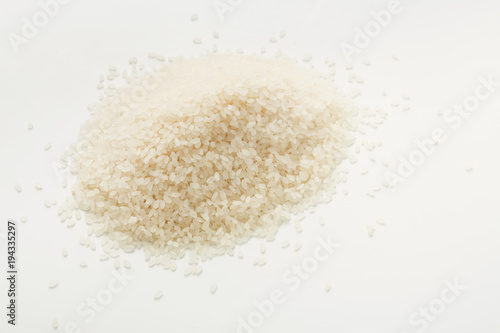 Pile of rice on white background