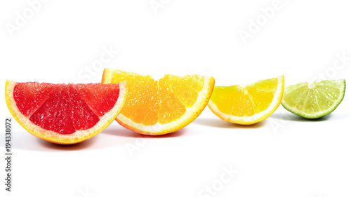 slices of orange  greatfruit  kiwi  lemon  lime on white background