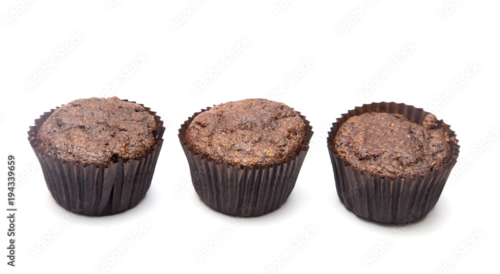 Whole Wheat Double Chocolate Chip Muffins Isolated on a White Background Whole Wheat Double Chocolate Chip Muffins Isolated on a White Background