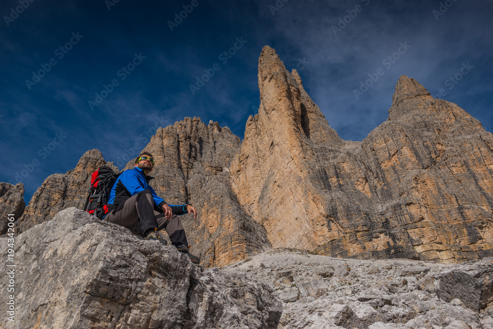 man in italian dolomites, in south tyrol, beautiful mountains scenery with man in italian alps