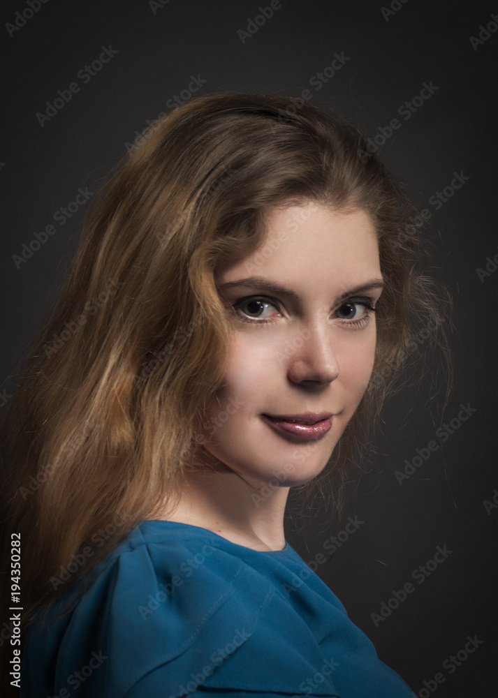 Portrait of a beautiful girl with long hair. Portrait of a beautiful girl with long hair.