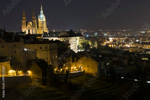 Night winter Prague City with gothic Castle, Czech Republic