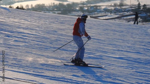 landscape winter slides ski resort,ski lift,going down downhill snowboarders and skiers.