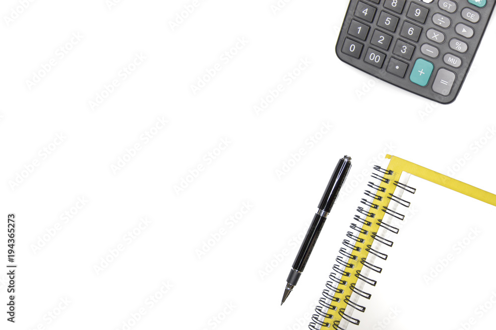 top view of notebook a pen and a calculator top view of notebook a pen and a calculator