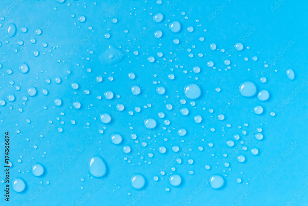 Blue background with water droplets
