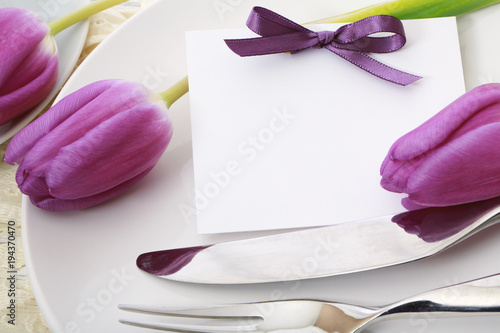 Celebration dinner theme with greeting card and dinner plate