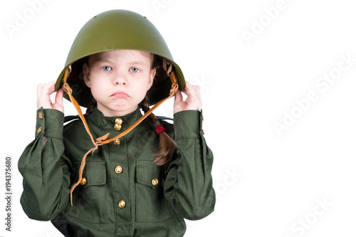 sad girl in military uniform, wearing a green hard hat on her head, isolated on white background © kurgu128