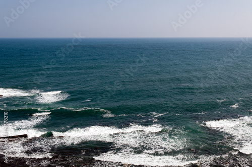 太平洋の押し寄せる波 © umamiseibun