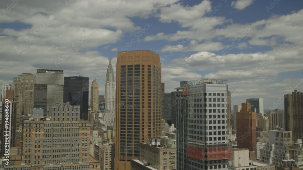 Manhattan Midtown High Rise View looking at Midtown, MetLife and Chrysler, Construction Crane, pan right to left Manhattan Midtown High Rise View looking at Midtown, MetLife and Chrysler, Construction Crane, pan right to left