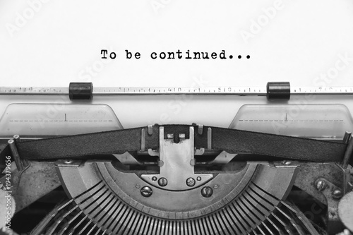 To be continued... text typed words on a old Vintage Typewriter. Close up.