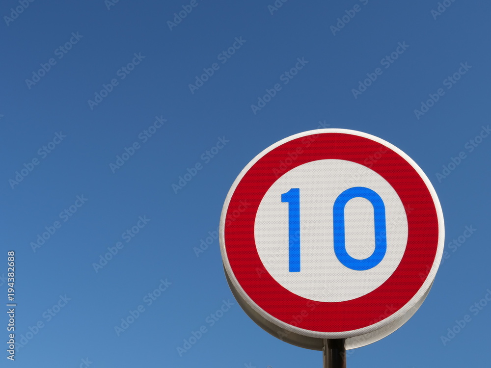 Tokyo,Japan-March 1, 2018: Road sign, Speed limit 10km per hour Tokyo,Japan-March 1, 2018: Road sign, Speed limit 10km per hour