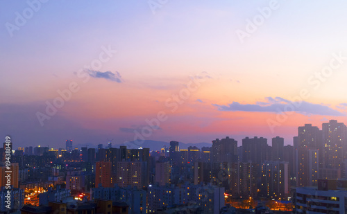 abstract blur bokeh of night light city at sunset