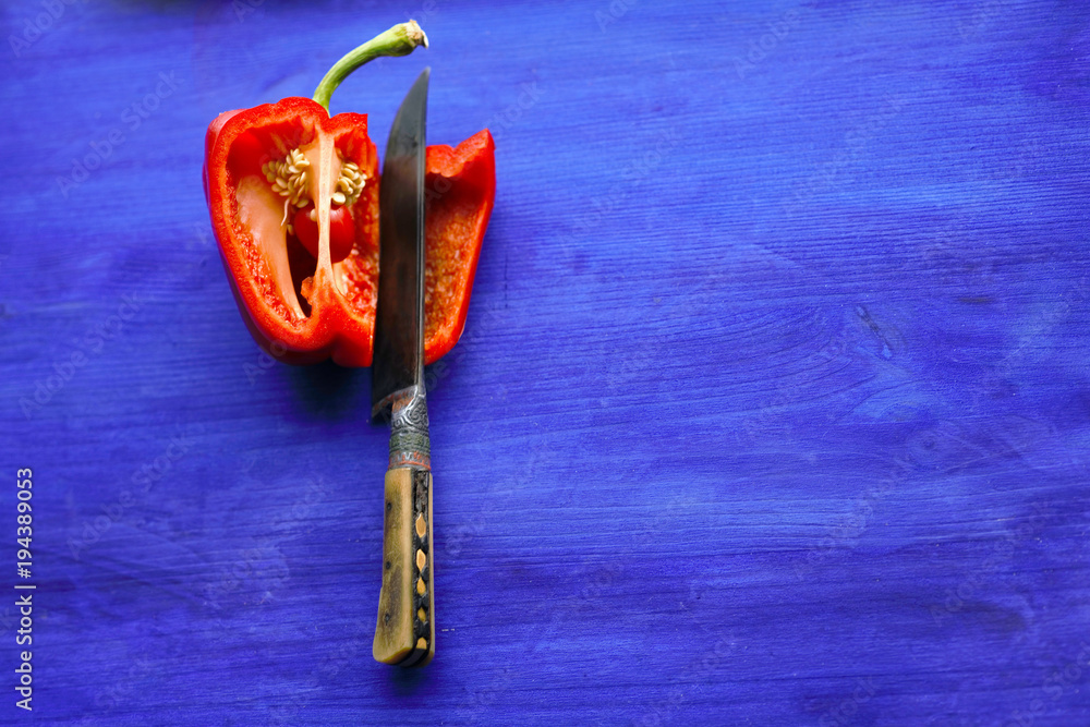 red pepper on blue background
red pepper on blue background