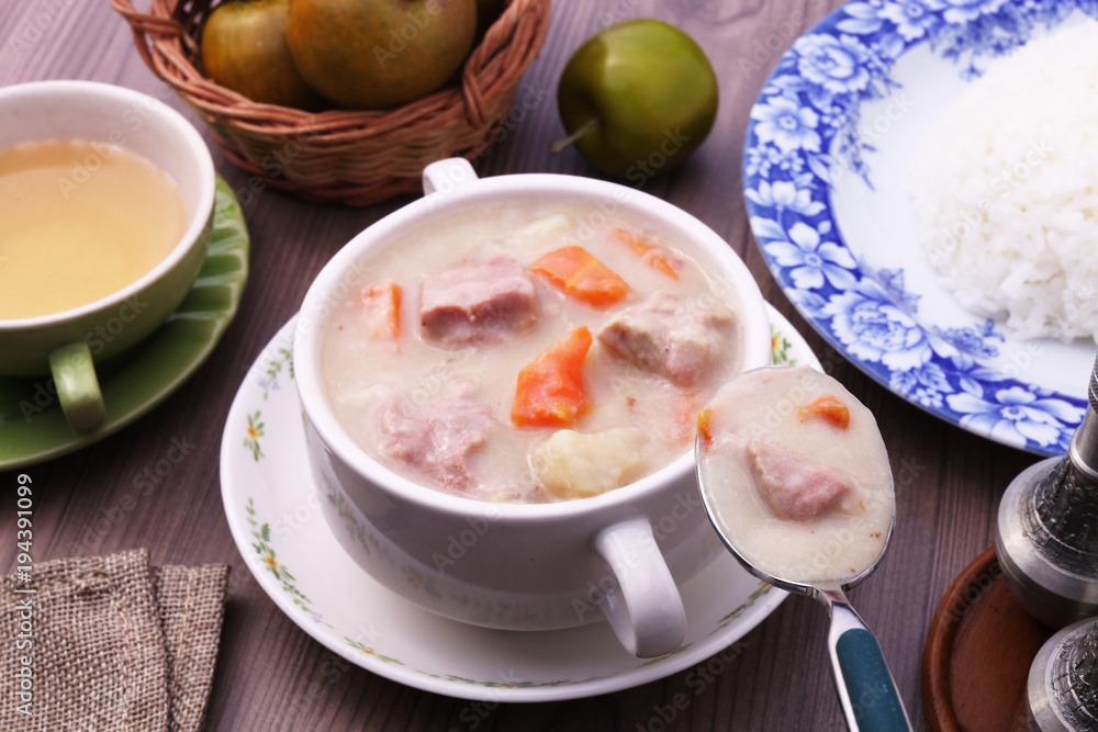 A bowl of creamy pork stew. A bowl of creamy pork stew.