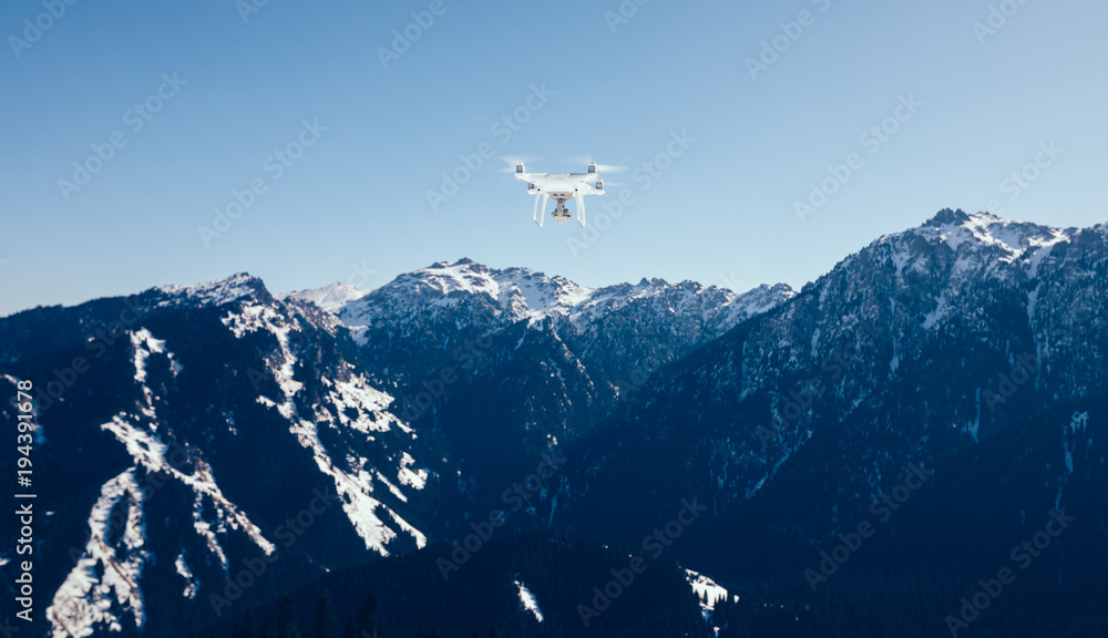 Fototapeta premium drone flying over winter mountain top