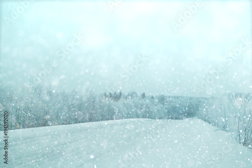 blurred background winter road snow landscape © kichigin19